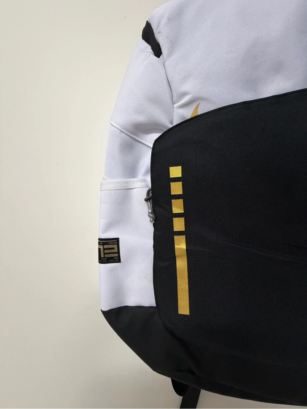 Men's Two-Tone White & Black Backpack with Gold Accent
